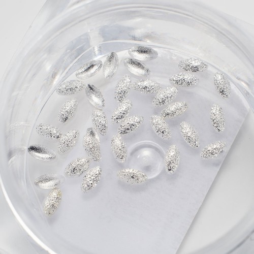 Komilfo texture rivets large oval 1.5*3 mm, silver, 50 pcs Komilfo texture rivets large oval 1.5*3 mm, silver, 50 pcs
