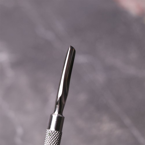 Komilfo pusher S for manicure and pedicure with a hatchet in a dichroic case