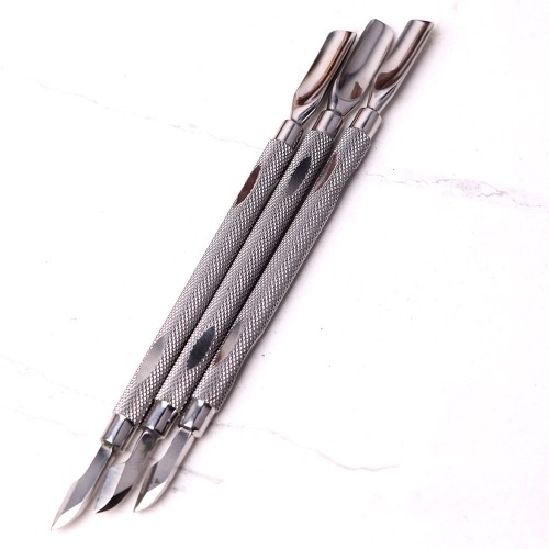 Komilfo pusher S for manicure and pedicure with a hatchet in a dichroic case