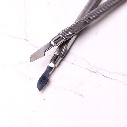 Komilfo pusher S for manicure and pedicure with a hatchet in a dichroic case