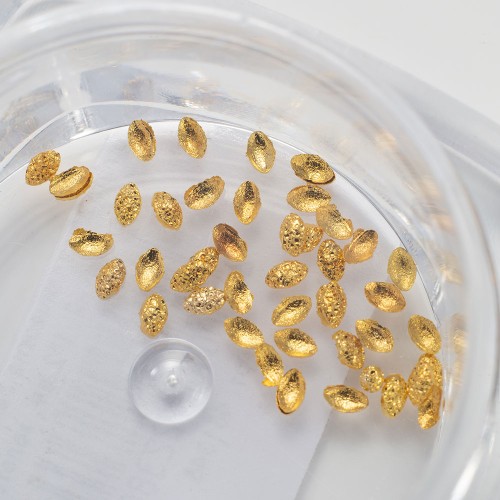 Komilfo texture rivets oval small 1*2 mm, gold, 50 pcs Komilfo texture rivets oval small 1*2 mm, gold, 50 pcs