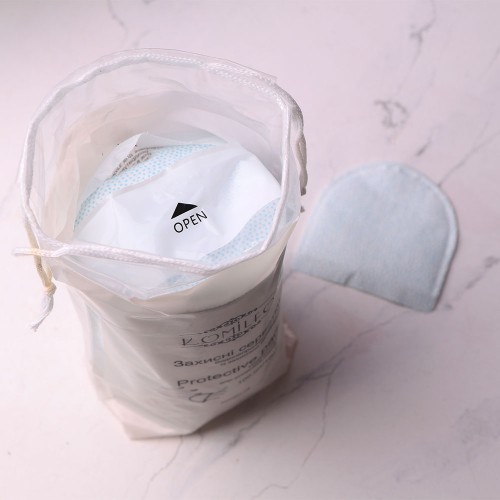 Komilfo Protective Pads – protective lint-free wipes, 100 pcs